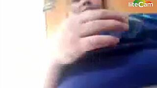 Milf with big tits shows off her assets