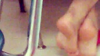 Playful Latina Showing Soles In Classroom