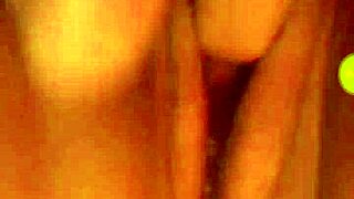 A young teen indulges in self-pleasure with her hands.