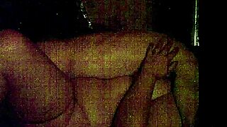 an attractive woman poses in a seductive manner