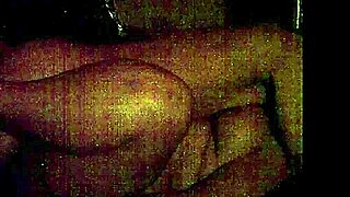 an attractive woman poses in a seductive manner