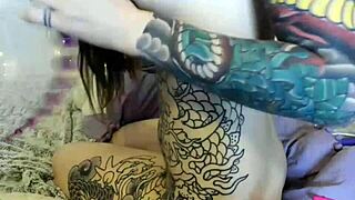 Check out this horny tattooed teen 18+ masturbating at home