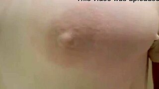 sheila gets her t-shirt wet in the shower