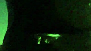 Crossdresser in latex struts outdoors with a vibrator buzzing in public.