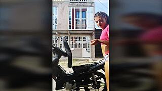 ts angelique monroe washes her bike in the open