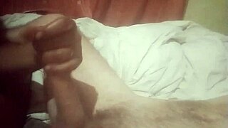 Man Cums on Foot While Getting Jerked Off