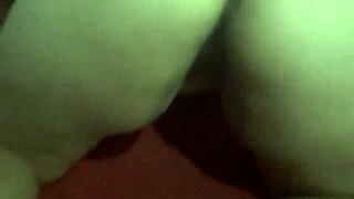 Pregnant brunette babe masturbates on all fours.