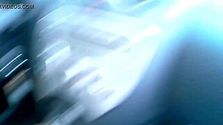 Blonde wife teases herself with toy in car.