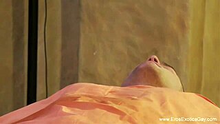 In the gay massage parlor, the mature amateur learns the technique of giving a handjob to his client