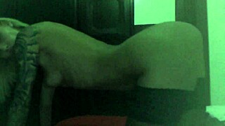 Sexy Blonde Cam Girl Strips in Black Stockings at Home