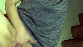 Wife rubbing pussy on stairs.