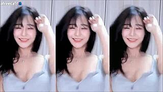 Korean cutie with big tits dances in sexy outfit