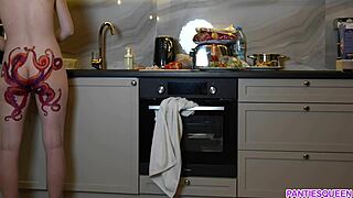 I’m Mesmerized by Naked Housewife with Octopus Tattoo Cooking in Kitchen!