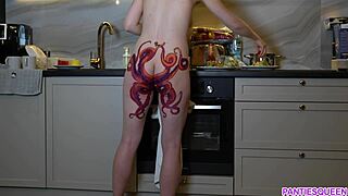 I’m Mesmerized by Naked Housewife with Octopus Tattoo Cooking in Kitchen!