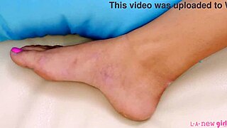 adorable blonde naked, showing off close-up on the sofa