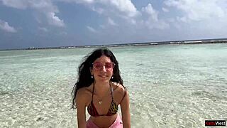 Beauty pees on Maldives beach getting golden shower over her glasses