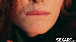 Stunning redhead Jia Lissa rides a massive dildo hard