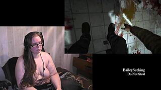 Naked brunette plays Outlast with natural tits in part 3