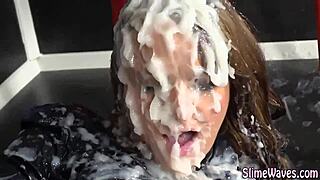 yo, see this bukkake babe rub her cunt while getting messy facials