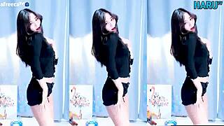 Korean girl performs a cute and sexy dance routine.