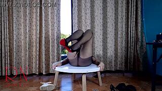 Nice lady strips in pantyhose at round table