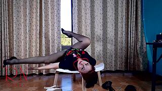 Nice lady strips in pantyhose at round table