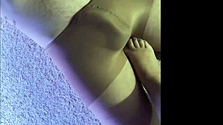 making my husband wear wet pantyhose for a kinky footjob.