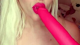 blondie fesser oils her ass and plays naked with pussy in pink lingerie, slapping huge tits for orgasm