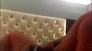 Squirting Whore Drenching Herself with Toys in Fishnets at Home