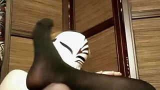 Petite babe in pantyhose teases with big tits solo