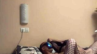 Skinny European cowgirl in fishnet bodysuit rides cock deep in both tight holes