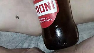 Gretala, so aroused and pregnant, rubs herself with a bottle. Intriguing!