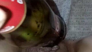 Gretala, so aroused and pregnant, rubs herself with a bottle. Intriguing!