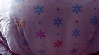 Hey, ever seen a Japanese girl mess around in a diaper? It's wild. I couldn't believe my eyes watching her struggle with it.