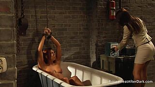 Sensual Lesbian Madame Kissing and Fingering Blindfolded Slave