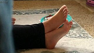 Cute feet caught on hidden cam while she relaxed unaware.