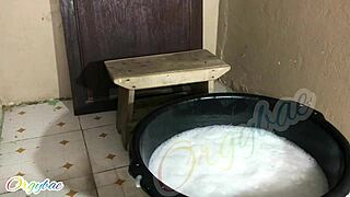 Housewife manages weekend laundry chores at home during holiday break