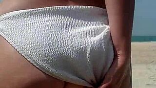 i just couldn't hold it, peeing in my white bikini on a public beach today.