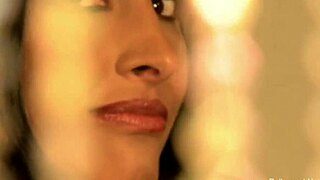 She performs a forbidden Indian dance ritual with teasing moves. Her charm captivates all!