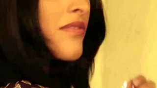 She performs a forbidden Indian dance ritual with teasing moves. Her charm captivates all!