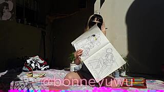 Bonneyuwu paints in a bikini under the sun, showcasing her petite latina curves.