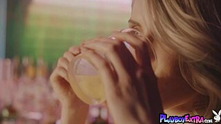 Amelia poses naked on the bar, showing her natural tits