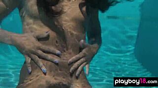 Naked ebony milf Ana Foxxx fingers her hairy black pussy under water in solo masturbation session