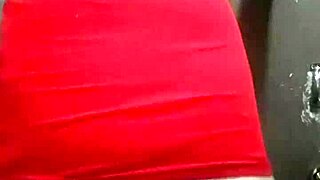 trans woman in a dress showing off her curves