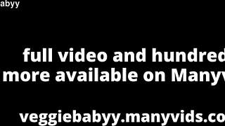 Redhead wears black latex catsuit corset for asmr video