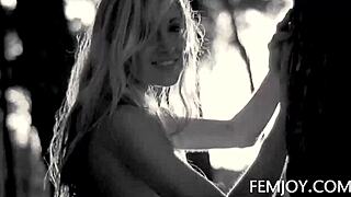 corinna, the busty blonde teen, poses nude at sunset