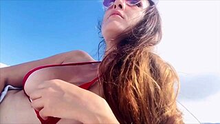 Italian milf Artemisia Love flashes big tits and hard nipples on public Miami beach.