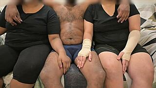 In this threesome, wife gives handjob to her friend. Enjoying the group action.