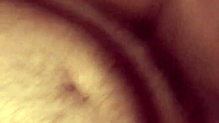 Old Wife Enjoys Sitting Comfortably on the Couch