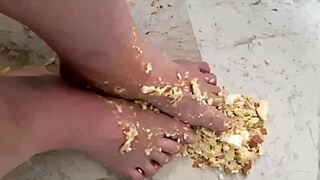 Coolmarina tired from street gets foot massage with hard eggs on floor